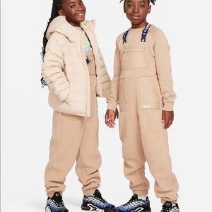 Unisex big Kids Nike fleece overalls in “hemp” (cream)
